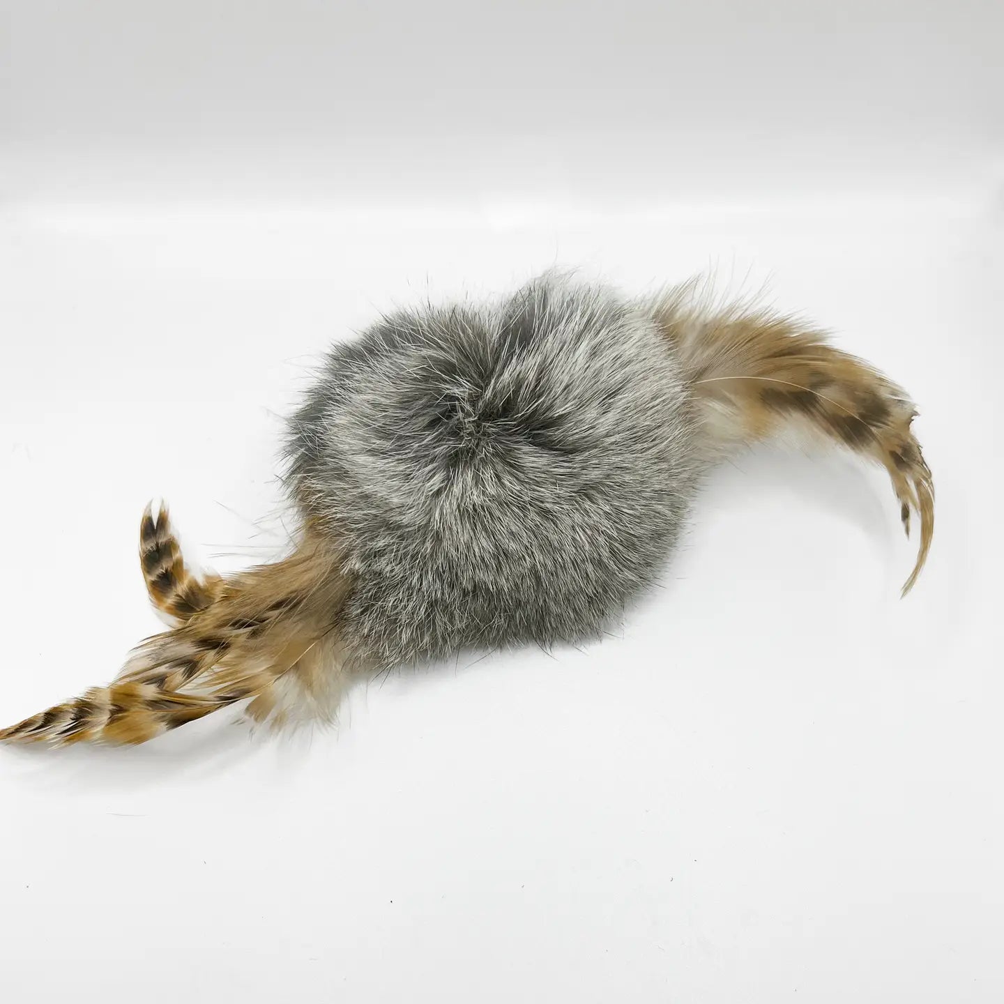 Kattleksak Spinners i kaninpäls och tuppfjäder
